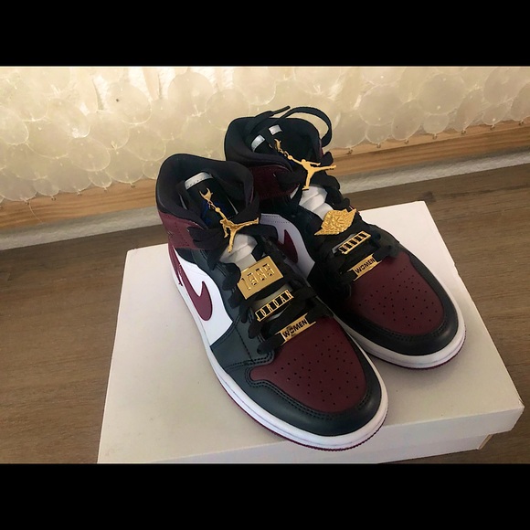 black and white jordan low tops